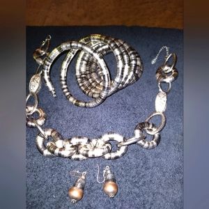 Arm bracelet with necklace and earrings